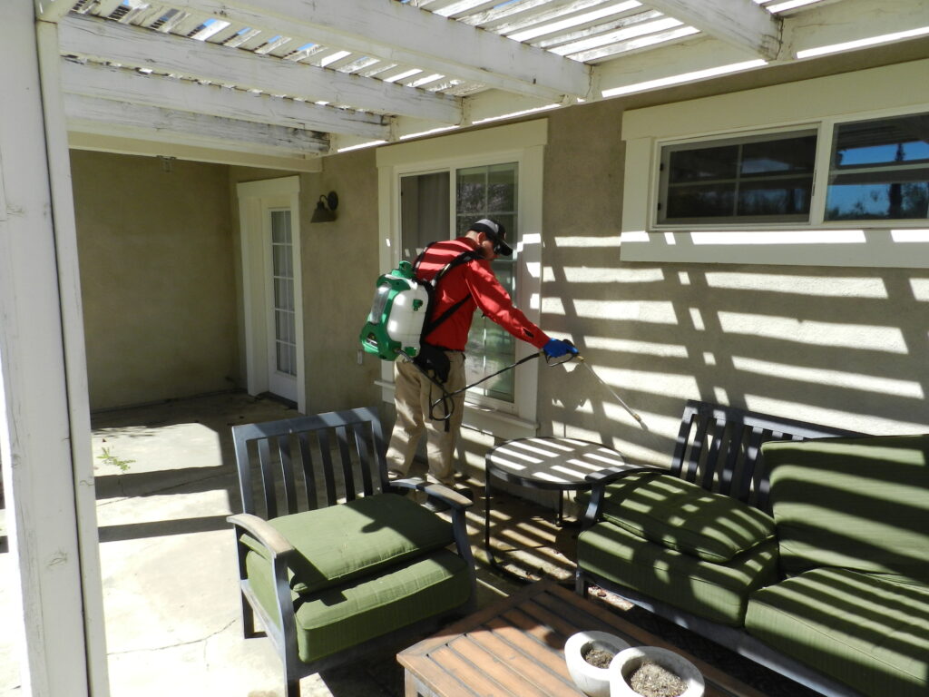 Bull's Eye Pest Control technician treating a Southern California property