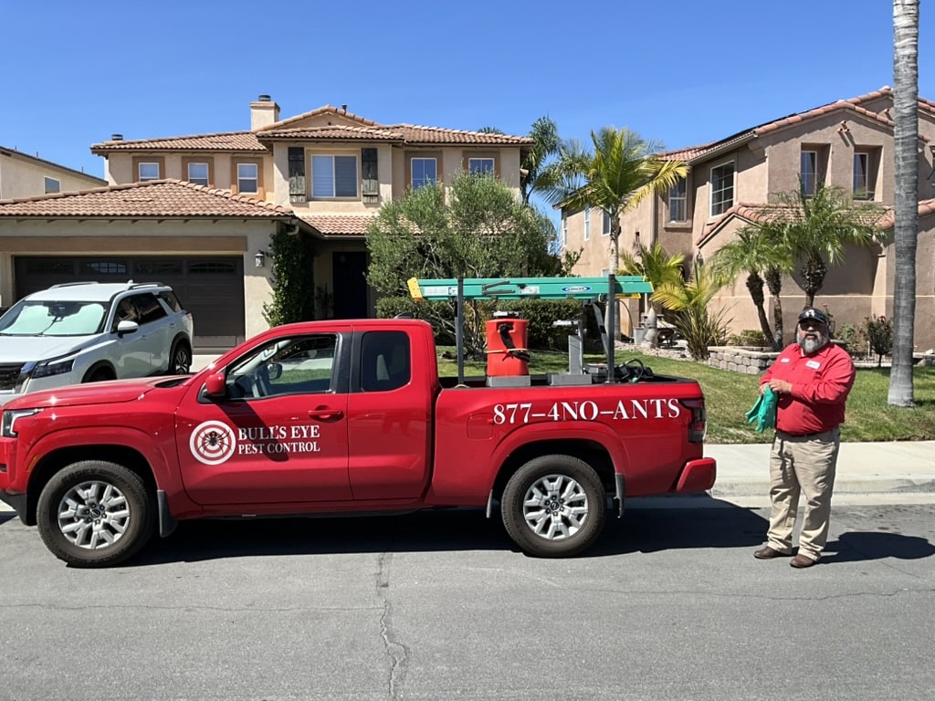 Bull's Eye Pest Control technician treating a Southern California property