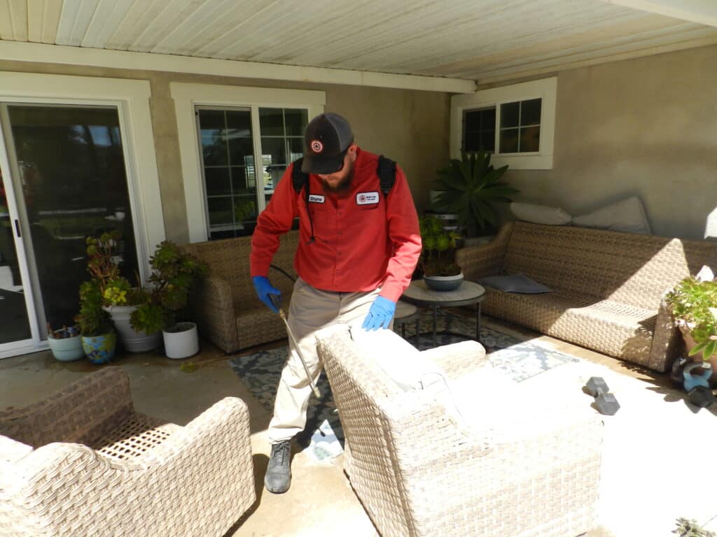 Bull's Eye Pest Control technician treating a Southern California property