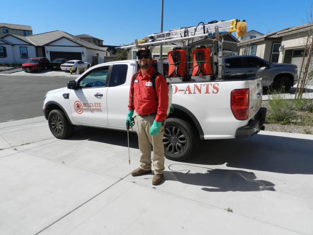 Bull's Eye Pest Control technician treating a Southern California property