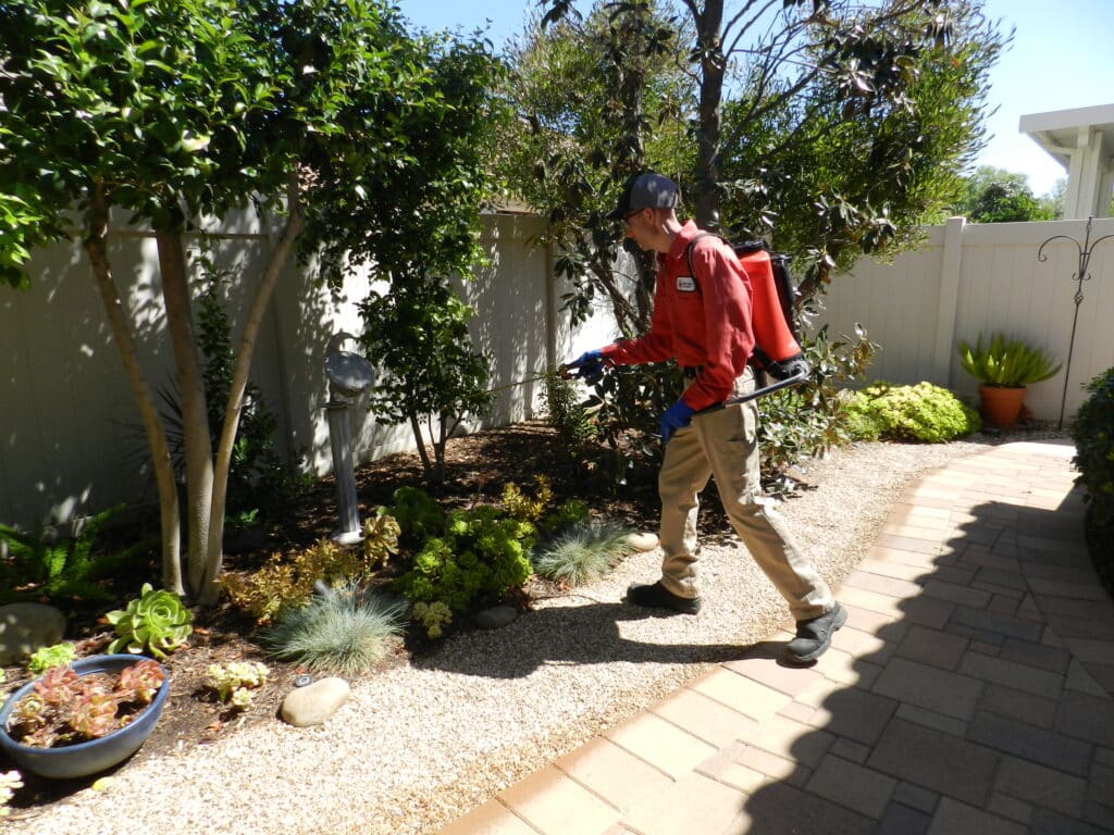 Bull's Eye Pest Control technician treating a Southern California property