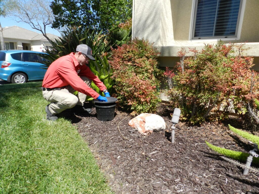 Bull's Eye Pest Control technician treating a Southern California property