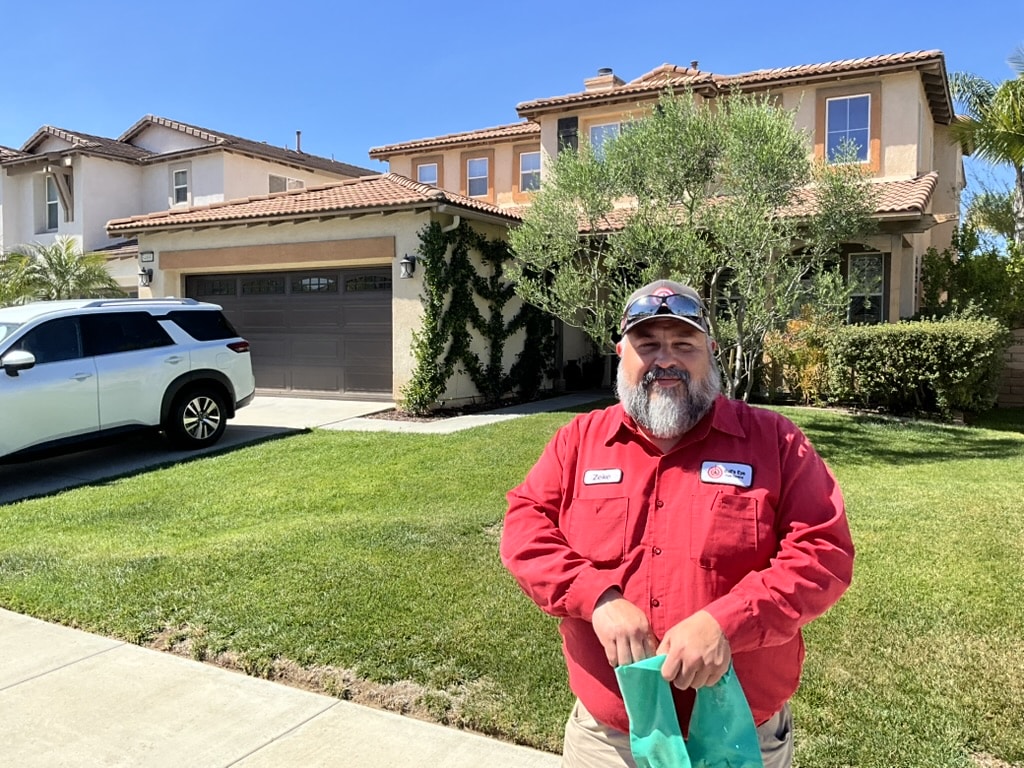 Bull's Eye Pest Control technician treating a Southern California property