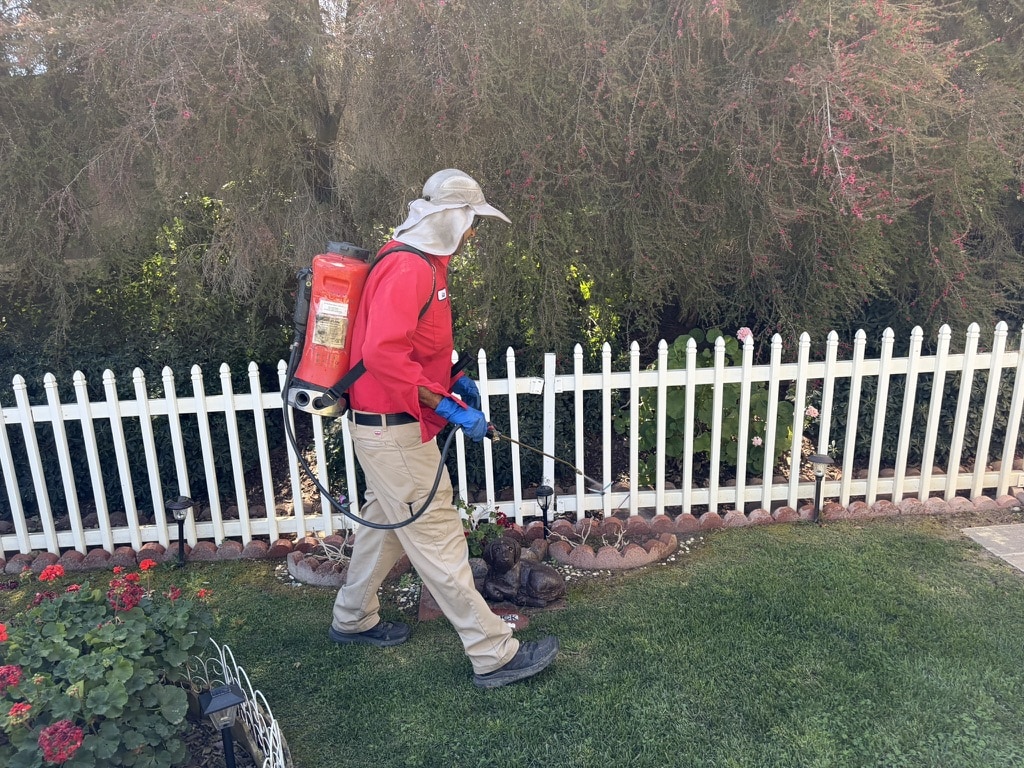 Bull's Eye Pest Control technician treating a Southern California property
