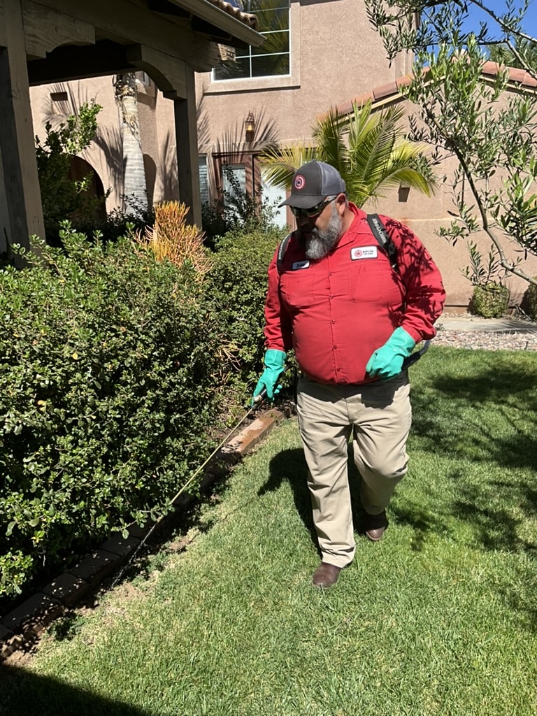 Bull's Eye Pest Control technician treating a Southern California property