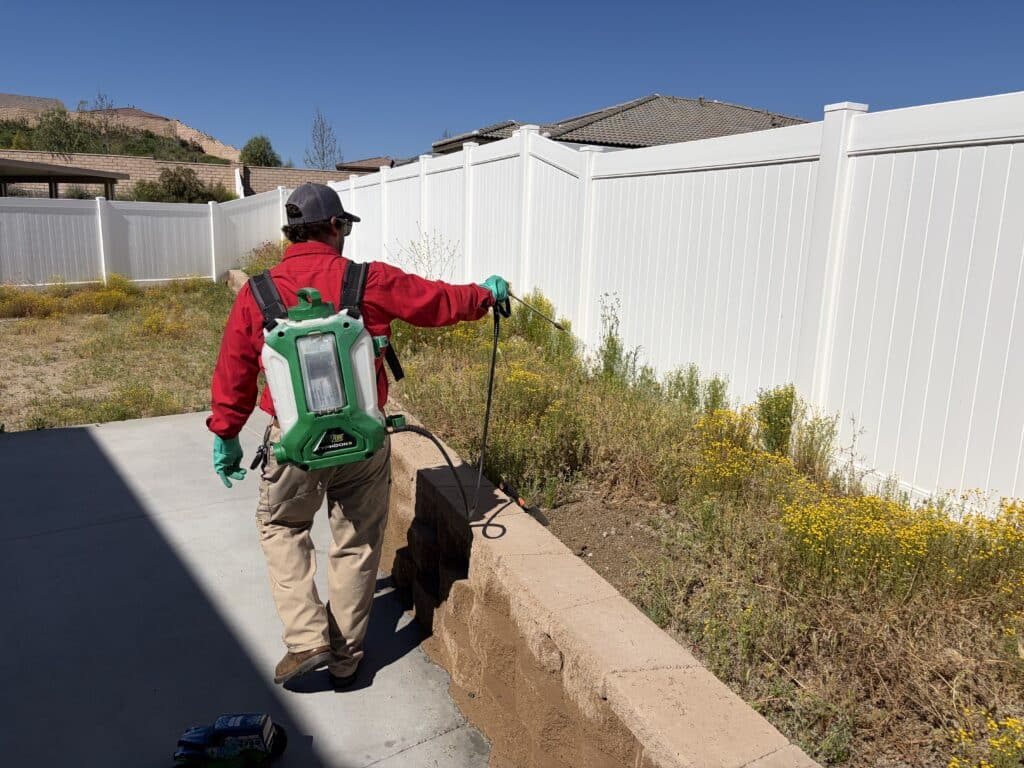 Bull's Eye Pest Control technician treating a Southern California property