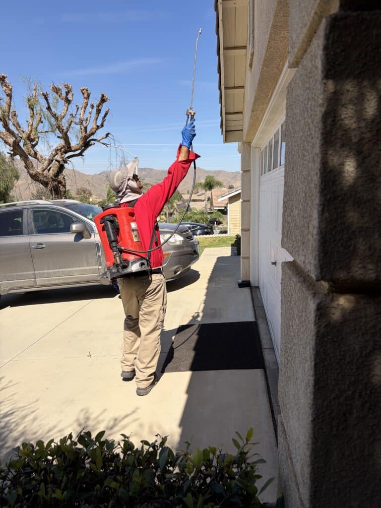 Bull's Eye Pest Control technician treating a Southern California property